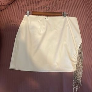 Pleather mini skirt with rhinestone fringe